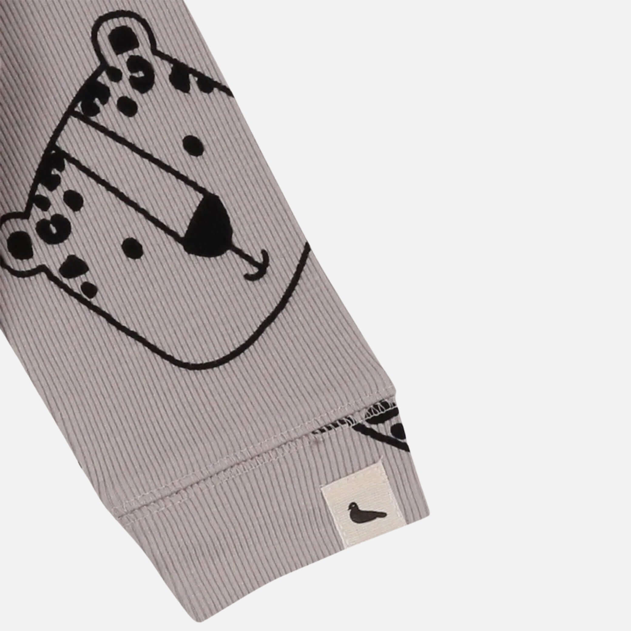 Tutina leopardata delle nevi