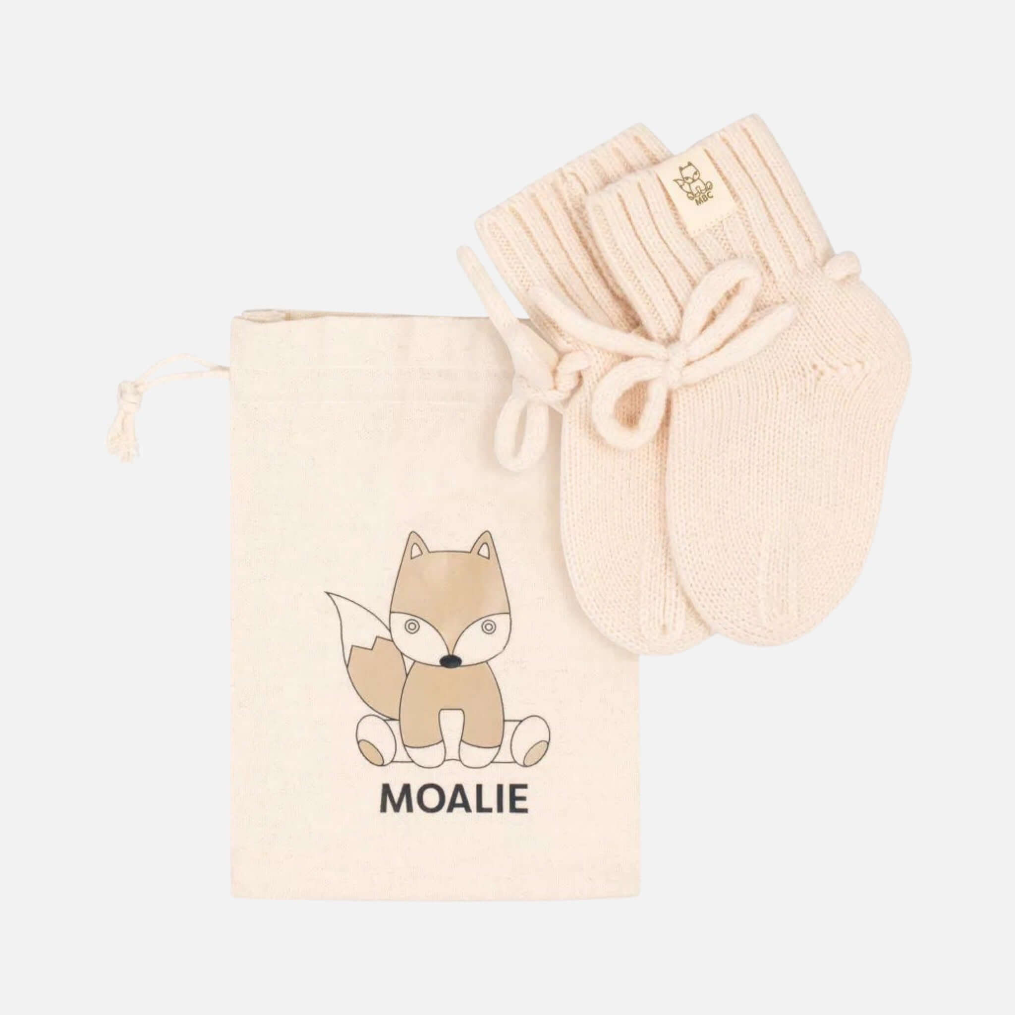 Baby-Hausschuhe aus Merinowolle in Creme