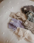 Hausschuhe in verschiedenen Farben für Babys