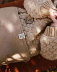 Morbida coperta KiCo Label realizzata al 100% in lana merino