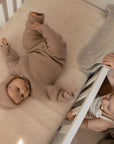 Tutina da neonato realizzata al 100% in morbidissima lana merino